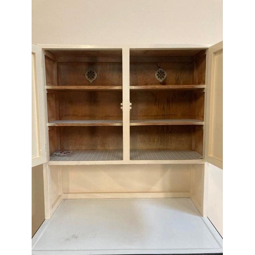 131 - A white painted Mid Century kitchen unit with metal work top, two drawers and two cupboards over and... 