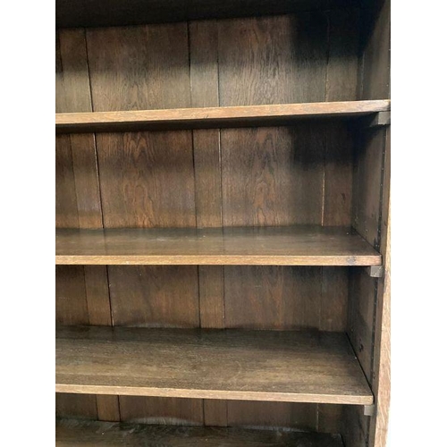 133 - A Mid Century four shelf oak bookcase (H195cm W121cm D33cm)AF