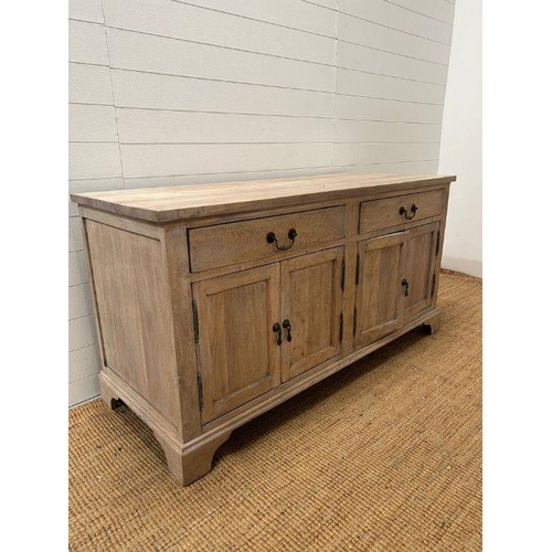 142 - A light beech Susie Watson  country house dresser, three adjustable shelves, sat on drawers and cupb... 