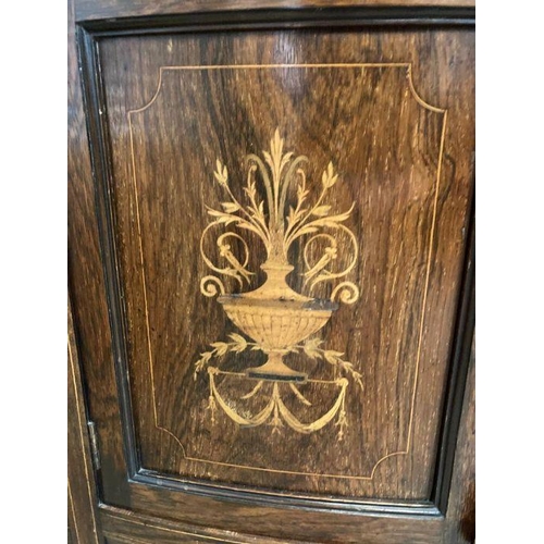 143 - A mahogany break front sideboard with marquetry to front with double doors flanked either side by sh... 