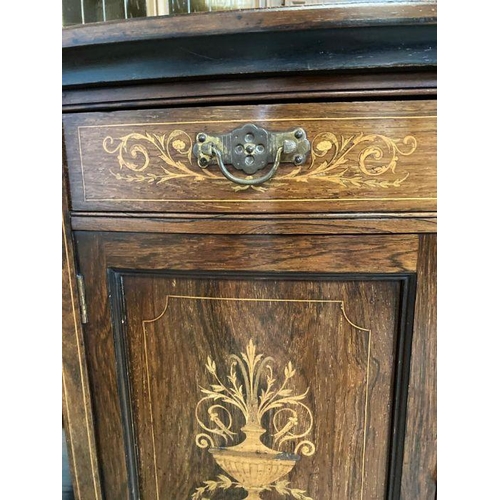 143 - A mahogany break front sideboard with marquetry to front with double doors flanked either side by sh... 