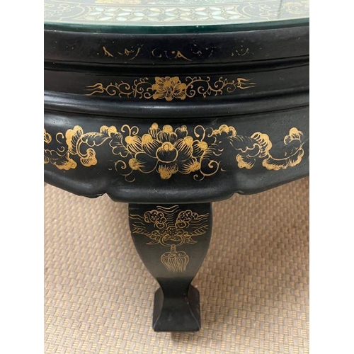 146 - A Chinese black lacquer coffee table (H47cm Dia76cm)