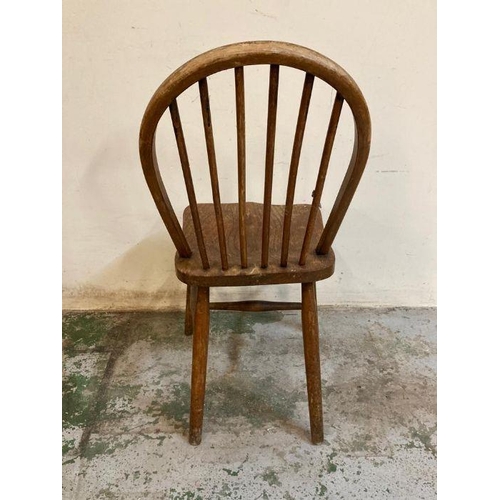 151 - A set of four oak spindle back dining chairs