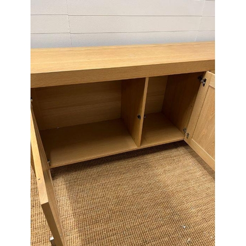 159 - A large light oak sideboard with chrome handles (H90cm W226cm D53cm)