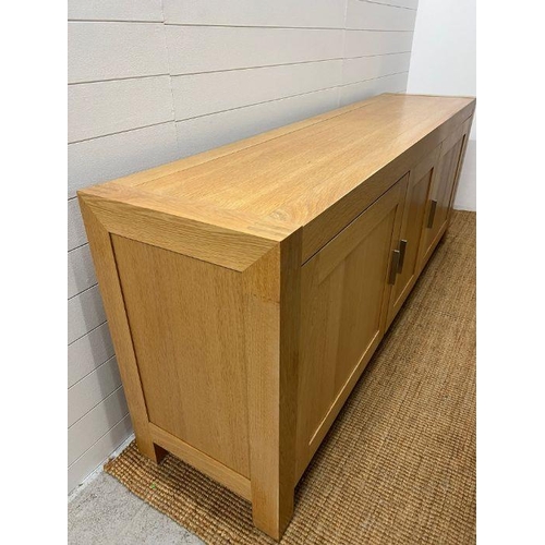 159 - A large light oak sideboard with chrome handles (H90cm W226cm D53cm)