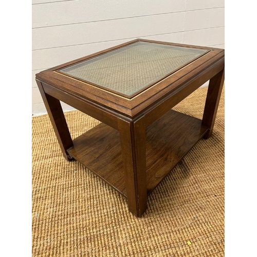 171 - A square coffee table with glass and rattan top