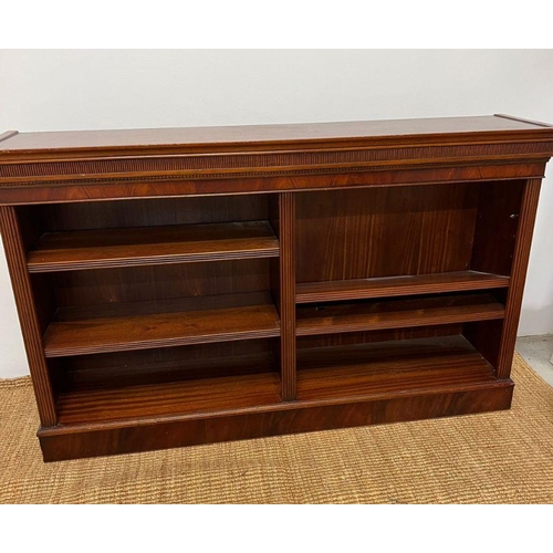 179 - A mahogany double open bookcase stand upon a plinth base (H92cm W52cm D35cm)