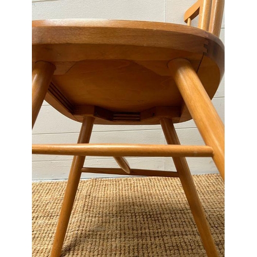 210 - Two pine spindle back chairs