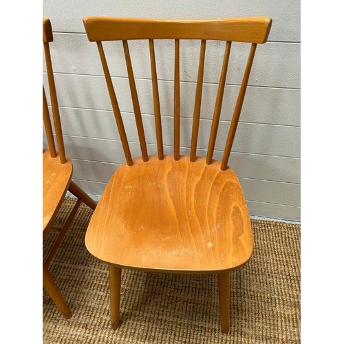 210 - Two pine spindle back chairs