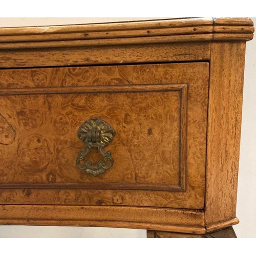 215 - A burr walnut single drawer side table on carved cabriole legs (H72cm W62cm D44cm)