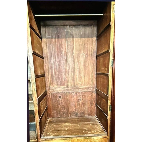 216 - A Victorian burr walnut triple wardrobe. A breakfront shape top cornice above three doors, two with ... 