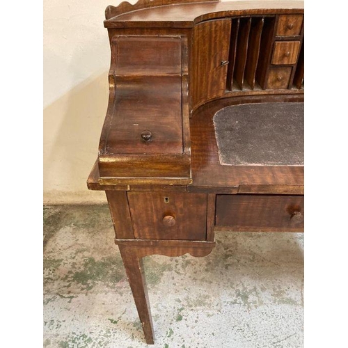 219 - An Edwardian carlton house desk with brown leather top