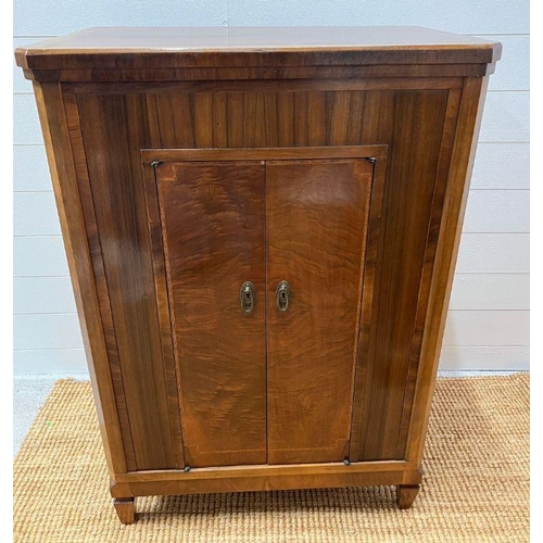 222 - An inlaid cabinet on tapering feet, radiogram cupboard (H100cm W70cm D45cm)