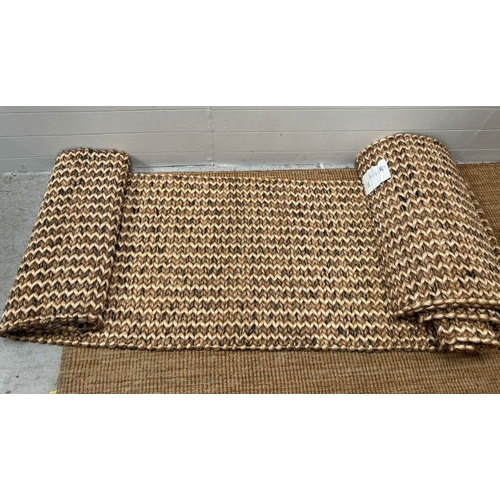 228 - A pair of 100% abaca runner rugs (280cm x 78cm)