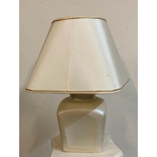 241 - A cream rectangular ceramic based table lamp