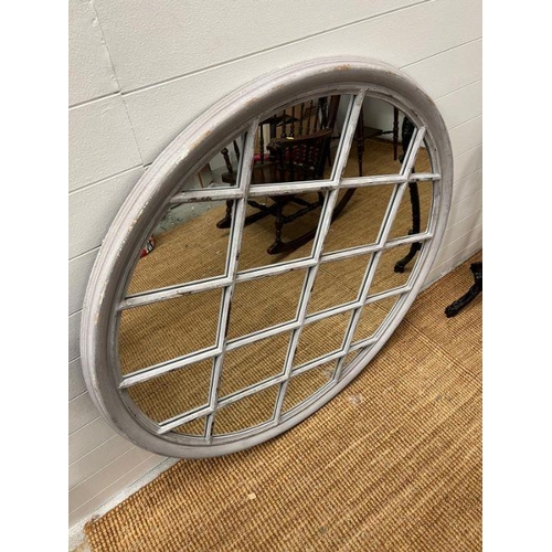 252 - A contemporary panelled circular mirror