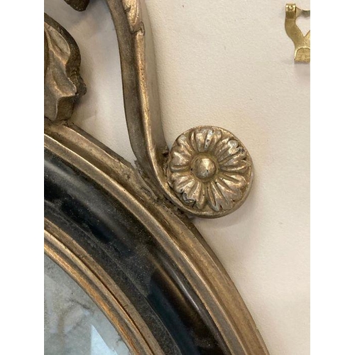 253 - A French style circular hall mirror with leaf scrolls and lions head details AF