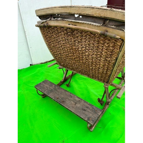 263 - A wooden and woven original sledge carriage (H125cm W220cm D140cm)