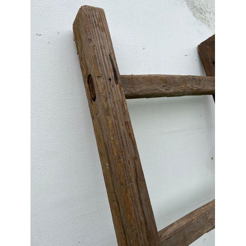 266 - A vintage wooden ladder