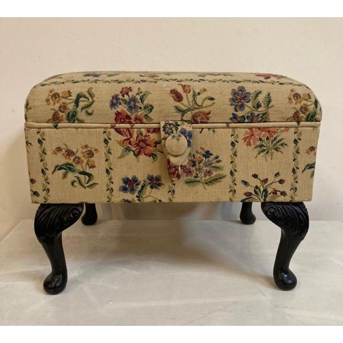 27 - A floral upholstered sewing box or foot stool on mahogany cabriole legs