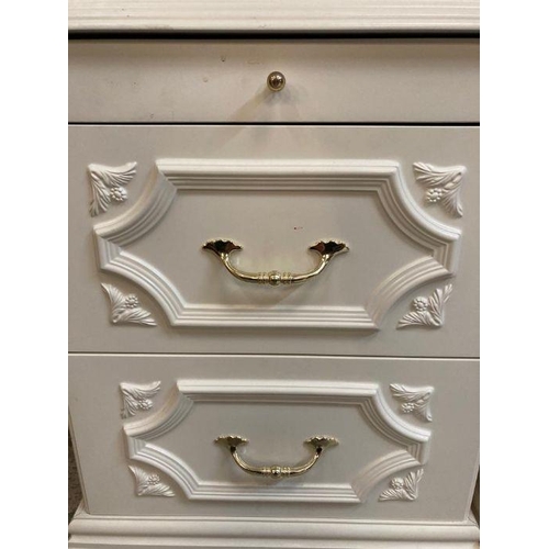 28 - A pair of white bedside tables with brass effect handles