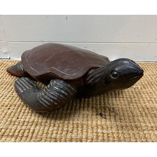 292 - A wooden carving of a turtle