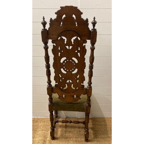 31 - A pair of oak Victorian carved hall chairs circa 1880