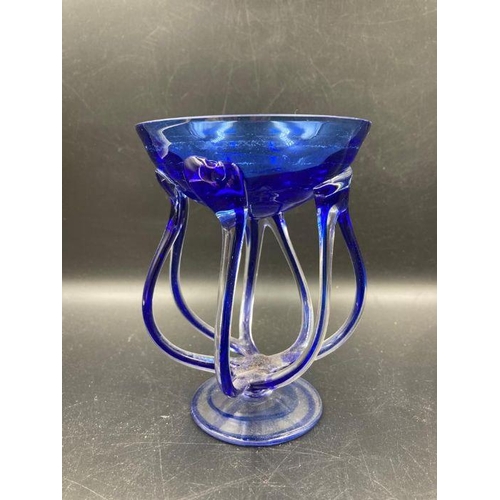 344 - Two Heron Art Glass bowls in black and clear and cobalt blue and clear glass