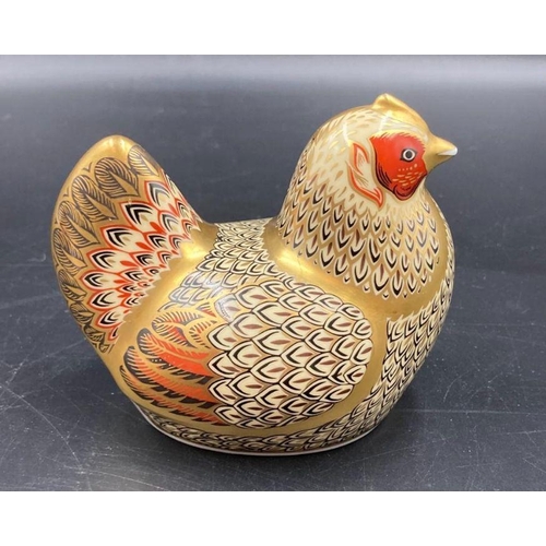 349 - Two boxed Royal Crown Derby paperweights, Farmyard Hen and Scottish Teddy, one with gold stopper and... 