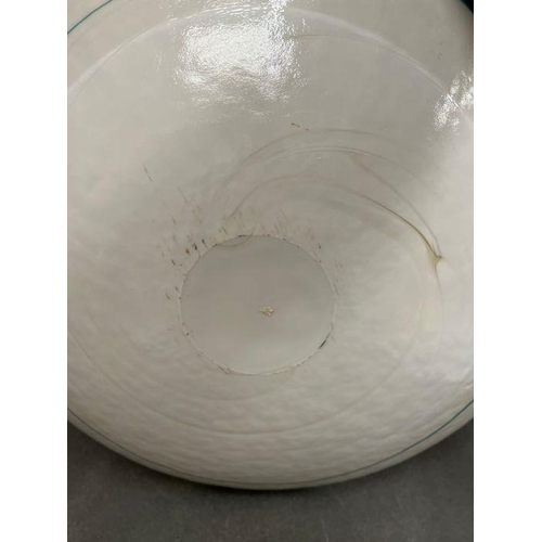 370 - A large decorative bowl with swirl design