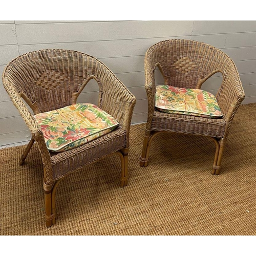 40 - Two wicker arm chairs