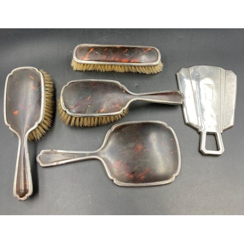 408 - A selection of hallmarked silver and tortoiseshell dressing table set and a separate silver marked S... 