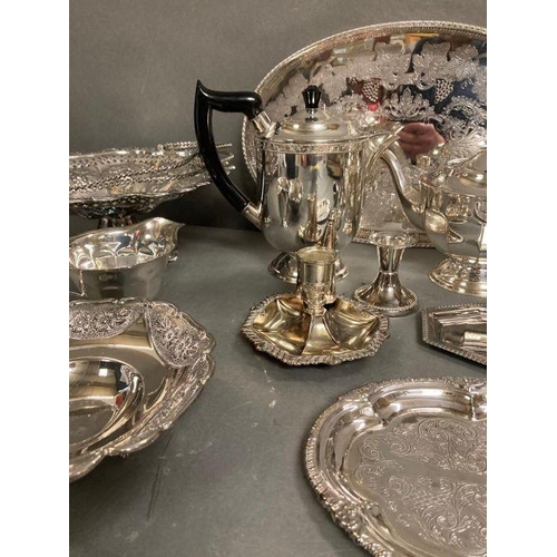 413 - A quantity of silver plate and white metal items to include coffee pot, tea pot and various trays