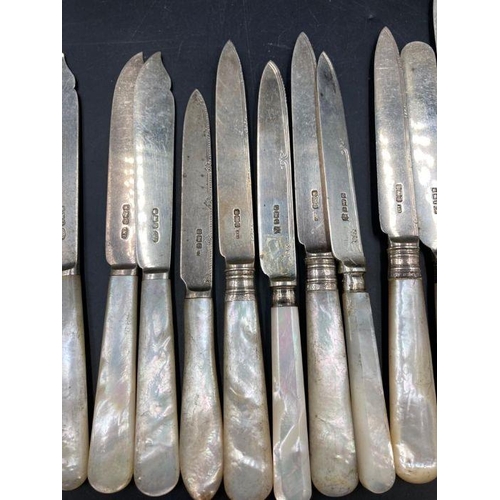 419 - A Harlequin set of silver knives with mother of pearl handles, various makers and hallmarks