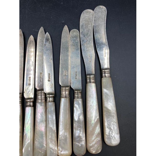 419 - A Harlequin set of silver knives with mother of pearl handles, various makers and hallmarks