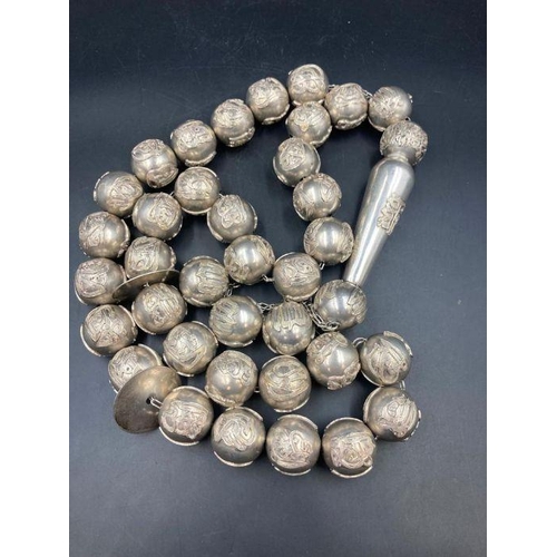 425 - A large set of Arabian silver worry beads approximately 1400g