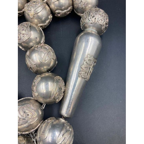 425 - A large set of Arabian silver worry beads approximately 1400g