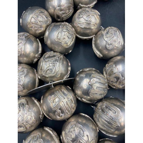 425 - A large set of Arabian silver worry beads approximately 1400g