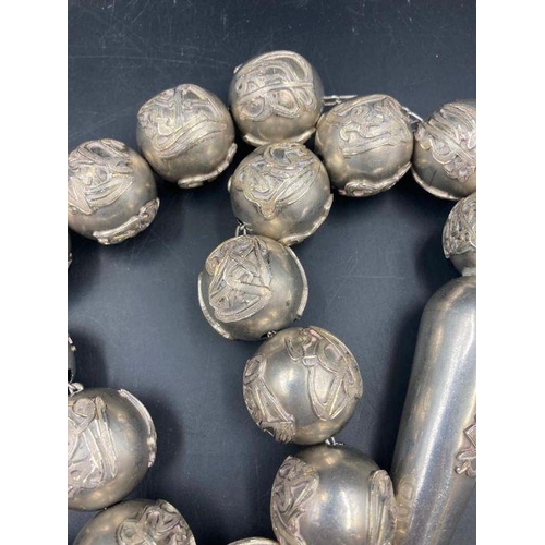 425 - A large set of Arabian silver worry beads approximately 1400g