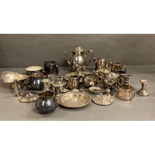 436 - A quantity of silver plate items to include coffe pot, milk jugs and candle sticks