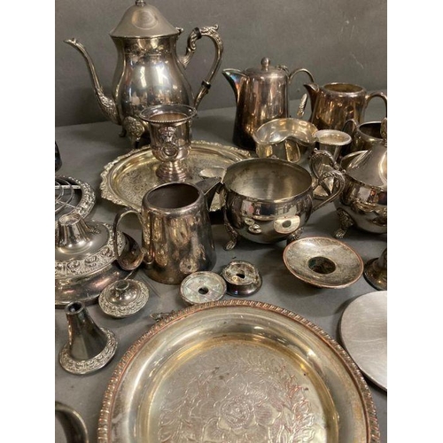 436 - A quantity of silver plate items to include coffe pot, milk jugs and candle sticks