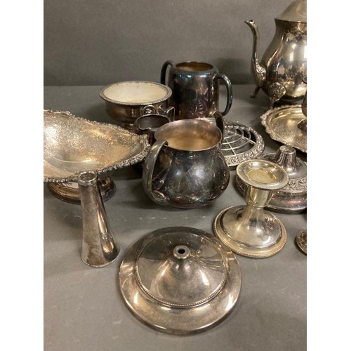 436 - A quantity of silver plate items to include coffe pot, milk jugs and candle sticks