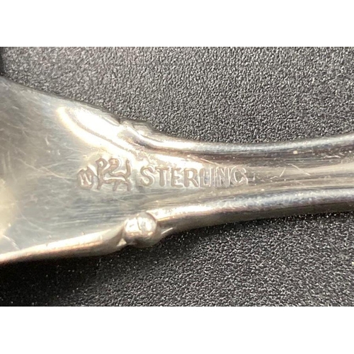 439 - A Sterling silver serving spoon with shell handle by WHITING MANUFACTURING COMPANY