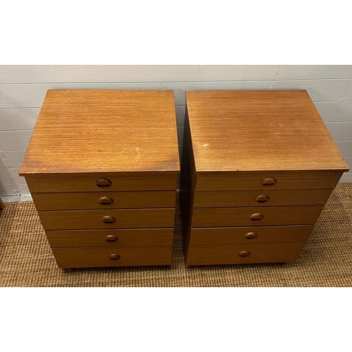 44 - A pair of Schreiber five drawer bedside table on castors (H71cm W50cm D43cm)