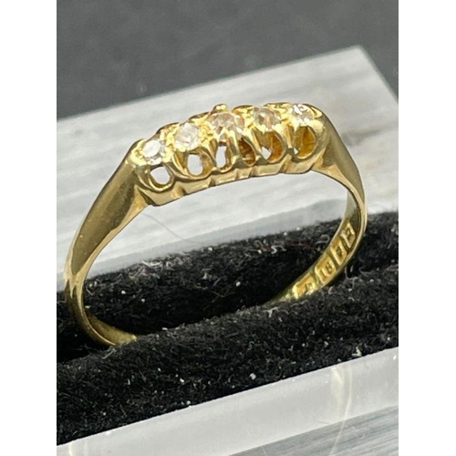 447 - A five stone 18ct yellow gold ring, approximate total weight 2.5g