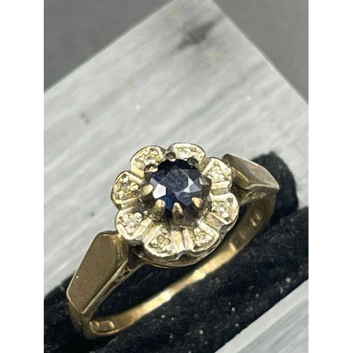 468 - A 9ct gold diamond and sapphire ring (Approximate Total weight 2.8g)