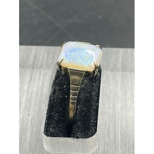 469 - A 9ct gold and opal ring