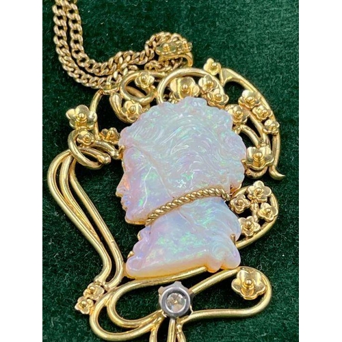 491 - An 18ct gold Victorian style necklace with an opal centre carved stone