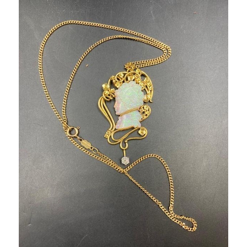 491 - An 18ct gold Victorian style necklace with an opal centre carved stone