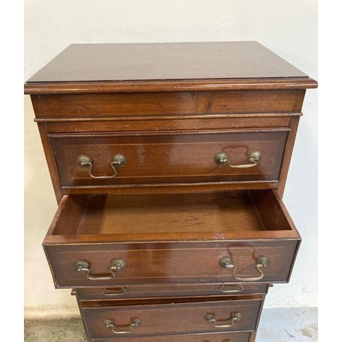 5 - A mahogany six drawer chest on chest with drop handles